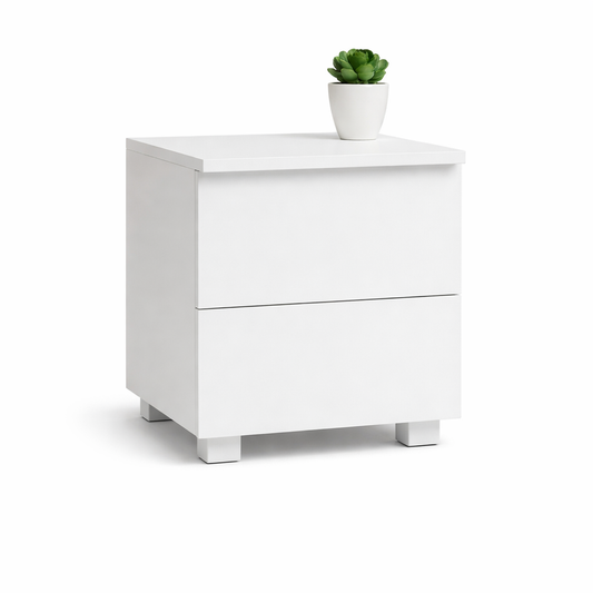 White nightstand with a small plant on a white background